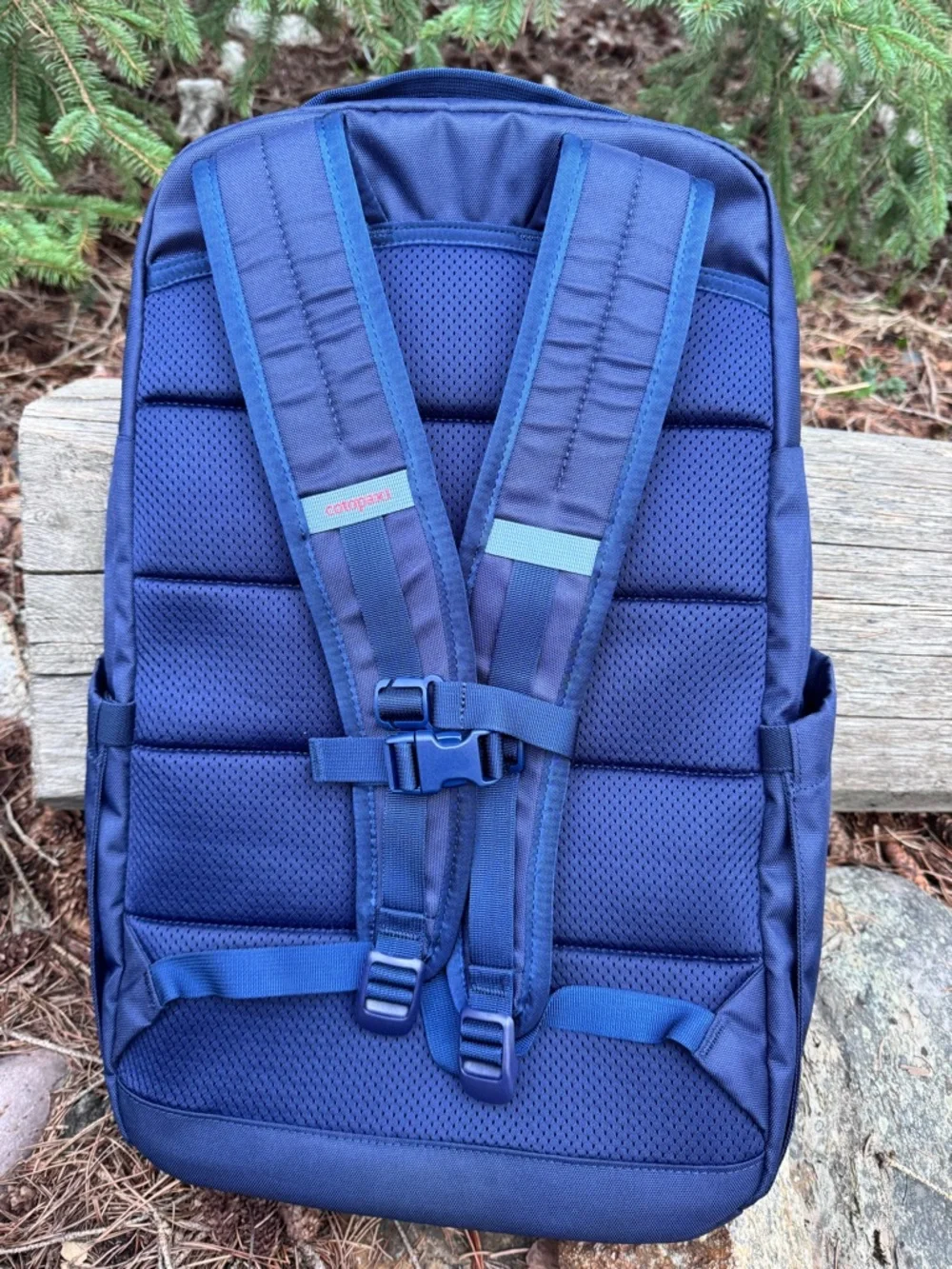cotopaxi WGU Navy Backpack with Light Blue Accents and Orange Zippers